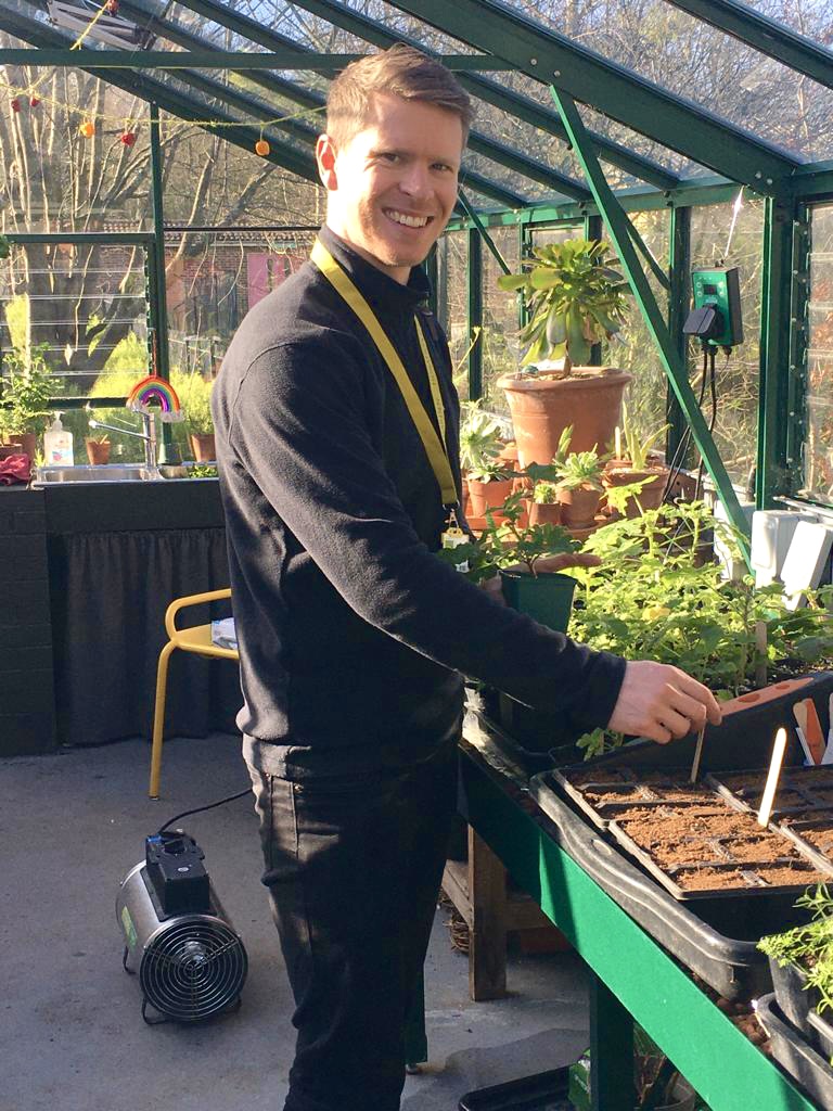 Liam Volunteering in the Greenhouse
