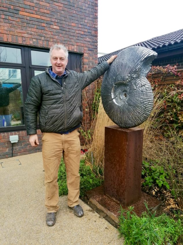 Hamish Mackie with Sculpture 'Ammonite'