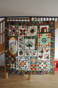 Beautiful farm-themed quilt